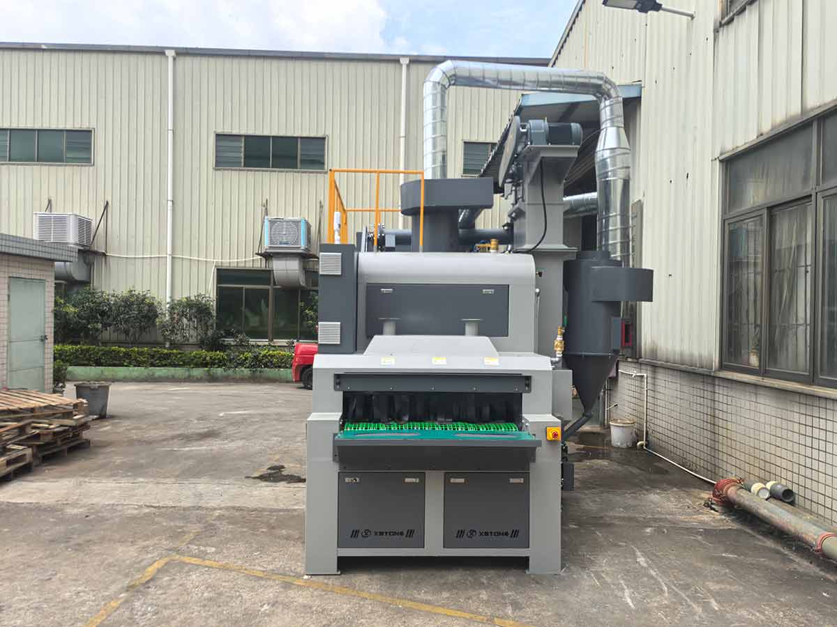 深圳百超機械生產的輸送式自動噴砂機實拍圖片