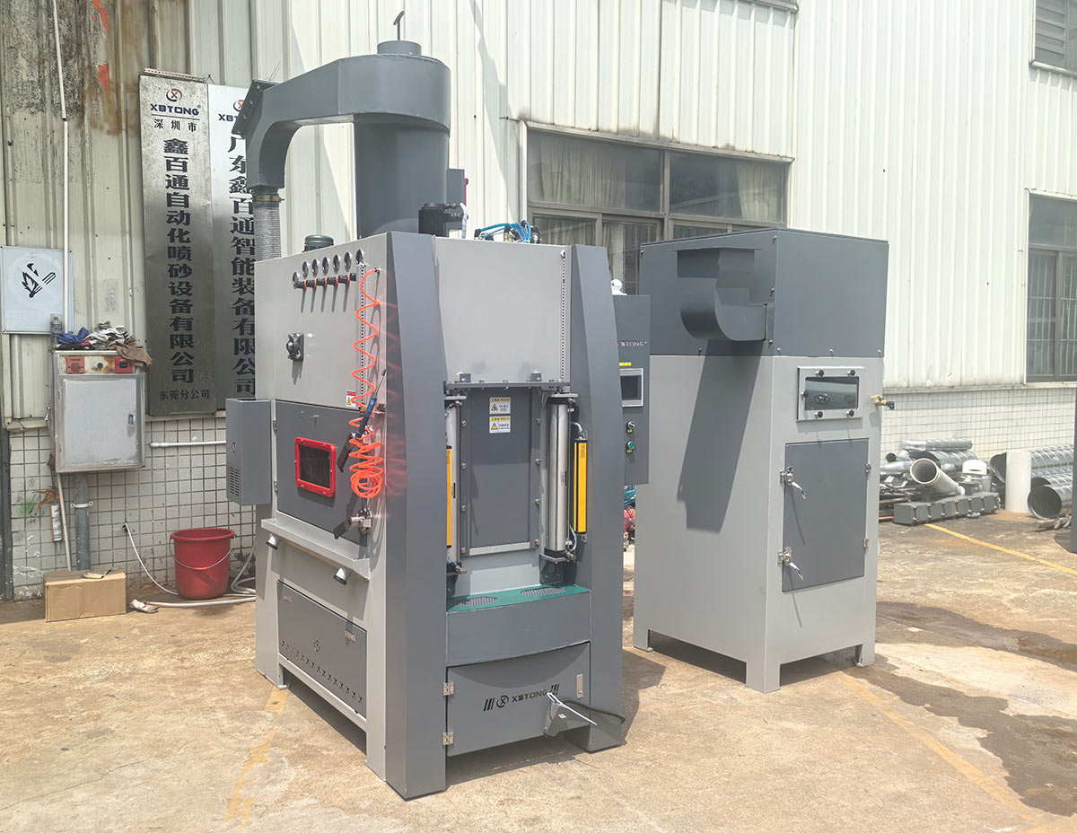 深圳百超噴砂機生產廠家制造的轉盤式自動噴砂機實拍圖片